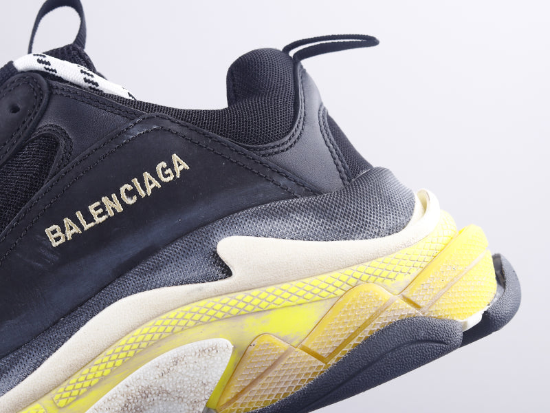 EI -Bla Triple S Black And Yellow Sneaker