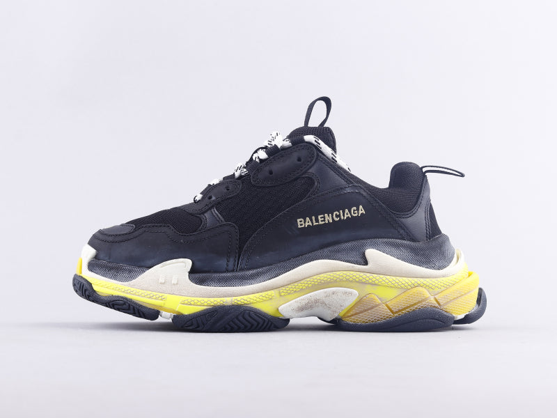 EI -Bla Triple S Black And Yellow Sneaker